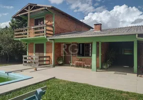 Foto 1 de Fazenda/Sítio com 4 Quartos à venda, 151m² em Costa Do Ipiranga, Gravataí