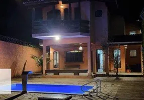Foto 1 de Sobrado com 4 Quartos à venda, 215m² em Massaguaçu, Caraguatatuba