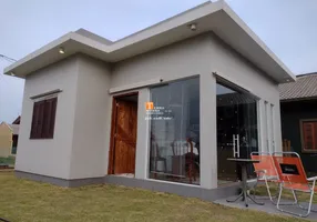 Foto 1 de Casa com 2 Quartos à venda, 67m² em Praia Paraiso, Torres