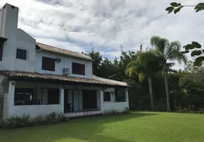 Foto 1 de Casa de Condomínio com 6 Quartos à venda, 390m² em Ponta das Canas, Florianópolis