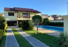 Foto 1 de Casa com 3 Quartos para venda ou aluguel, 200m² em Partenon, Porto Alegre