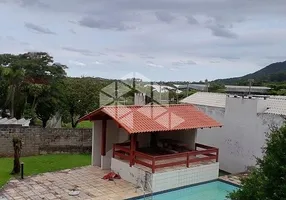 Foto 1 de Casa com 4 Quartos à venda, 273m² em Lagoa da Conceição, Florianópolis