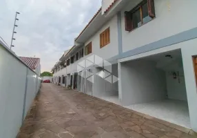 Foto 1 de Casa de Condomínio com 3 Quartos à venda, 118m² em Vila Nova, Porto Alegre