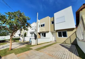 Foto 1 de Casa de Condomínio com 2 Quartos à venda, 106m² em Mário Quintana, Porto Alegre