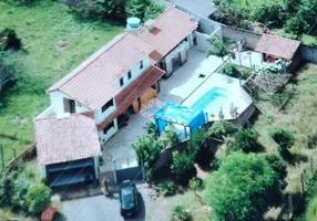 Foto 1 de Casa com 4 Quartos à venda, 300m² em Novo Mundo, Gravataí
