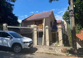 Foto 1 de Casa com 4 Quartos à venda, 336m² em Teresópolis, Porto Alegre