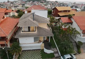 Foto 1 de Casa de Condomínio com 3 Quartos para venda ou aluguel, 374m² em Coqueiros, Florianópolis