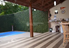 Foto 1 de Casa com 3 Quartos à venda, 300m² em Vila Nova, Porto Alegre