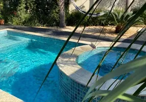 Foto 1 de Casa com 4 Quartos à venda, 406m² em Condomínio do Lago, Goiânia