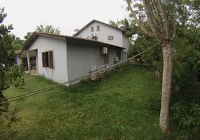 Foto 1 de Casa com 5 Quartos à venda, 229m² em Ponta Grossa, Porto Alegre