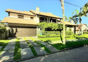 Foto 1 de Casa com 4 Quartos para venda ou aluguel, 400m² em Jurerê Internacional, Florianópolis