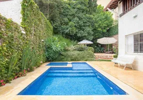 Foto 1 de Casa com 4 Quartos à venda, 390m² em Santa Lúcia, Belo Horizonte