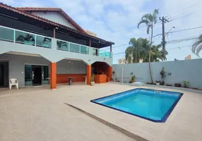 Foto 1 de Sobrado com 4 Quartos à venda, 265m² em Vila Tupi, Praia Grande