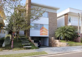 Foto 1 de Casa de Condomínio com 5 Quartos para venda ou aluguel, 406m² em Alphaville, Gravataí