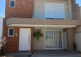 Foto 1 de Casa de Condomínio com 3 Quartos à venda, 180m² em Hípica, Porto Alegre