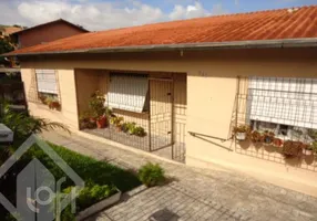 Foto 1 de Casa com 3 Quartos à venda, 90m² em Campo Novo, Porto Alegre
