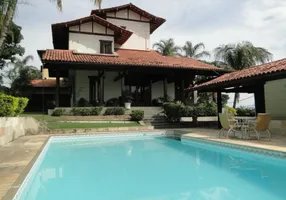 Foto 1 de Casa com 4 Quartos para venda ou aluguel, 550m² em Camboinhas, Niterói