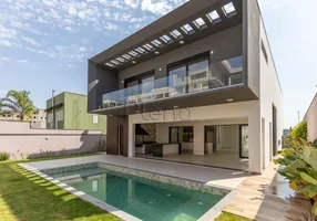 Foto 1 de Casa de Condomínio com 4 Quartos para venda ou aluguel, 440m² em Loteamento Alphaville Campinas, Campinas
