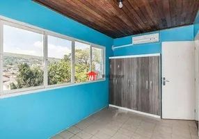 Foto 1 de Casa de Condomínio com 3 Quartos à venda, 141m² em Teresópolis, Porto Alegre