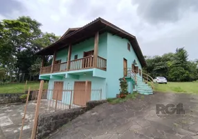 Foto 1 de Casa com 3 Quartos à venda, 359m² em Lomba do Pinheiro, Porto Alegre