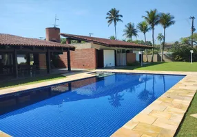 Foto 1 de Casa de Condomínio com 4 Quartos à venda, 465m² em Jardim Acapulco , Guarujá