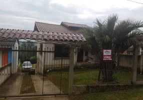 Foto 1 de Casa com 3 Quartos à venda, 63m² em Tarumã, Viamão