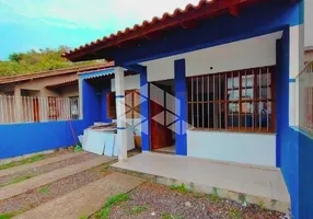 Foto 1 de Casa com 2 Quartos à venda, 68m² em Loteamento Jardim Timbauva, Gravataí