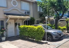 Foto 1 de Casa de Condomínio com 2 Quartos à venda, 70m² em Humaitá, Porto Alegre