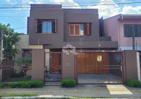 Foto 1 de Sobrado com 4 Quartos à venda, 199m² em Harmonia, Canoas