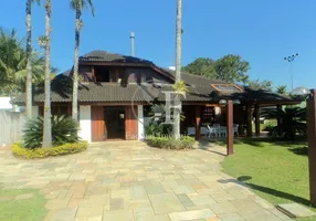 Foto 1 de Casa de Condomínio com 4 Quartos à venda, 550m² em Jardim Acapulco , Guarujá