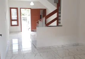 Foto 1 de Casa com 2 Quartos à venda, 76m² em Guarujá, Porto Alegre