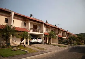 Foto 1 de Casa de Condomínio com 3 Quartos à venda, 244m² em Cavalhada, Porto Alegre