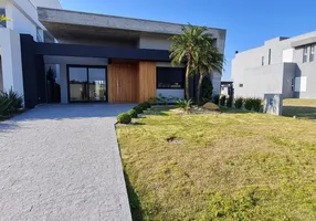 Foto 1 de Casa de Condomínio com 4 Quartos à venda, 220m² em Xangri la, Xangri-lá