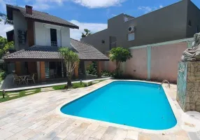 Foto 1 de Casa com 4 Quartos à venda, 240m² em Riviera de São Lourenço, Bertioga