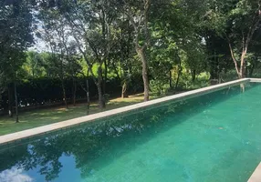 Foto 1 de Casa de Condomínio com 5 Quartos à venda, 700m² em Estancia Das Amendoeiras, Lagoa Santa