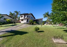 Foto 1 de Casa com 3 Quartos à venda, 248m² em Vila Nova, Porto Alegre