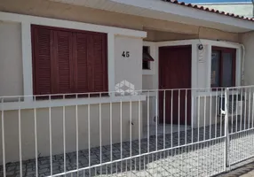 Foto 1 de Casa de Condomínio com 3 Quartos à venda, 69m² em São Tomé, Viamão