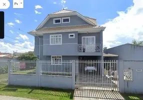 Foto 1 de Sobrado com 3 Quartos à venda, 195m² em Novo Mundo, Curitiba