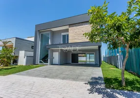 Foto 1 de Casa de Condomínio com 4 Quartos à venda, 294m² em Alphaville, Porto Alegre