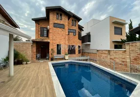 Foto 1 de Casa de Condomínio com 4 Quartos para venda ou aluguel, 351m² em Parque da Hípica, Campinas