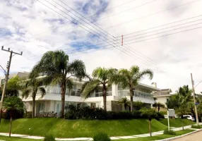 Foto 1 de Casa com 4 Quartos para venda ou aluguel, 600m² em Jurerê Internacional, Florianópolis