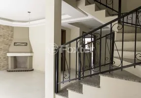 Foto 1 de Casa de Condomínio com 4 Quartos à venda, 274m² em Vila Assunção, Porto Alegre