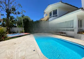 Foto 1 de Casa de Condomínio com 4 Quartos à venda, 344m² em Lagoa da Conceição, Florianópolis