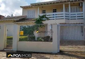 Foto 1 de Casa com 3 Quartos à venda, 246m² em Vila Nova, Porto Alegre