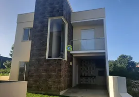 Foto 1 de Sobrado com 2 Quartos à venda, 105m² em Ambrósio, Garopaba