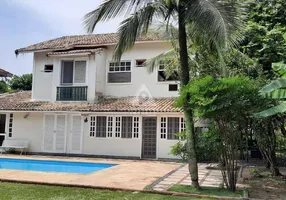 Foto 1 de Casa com 4 Quartos à venda, 325m² em Barra da Tijuca, Rio de Janeiro