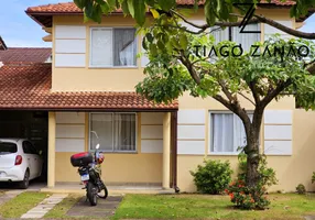 Foto 1 de Casa de Condomínio com 4 Quartos à venda, 180m² em Laranjeiras, Serra
