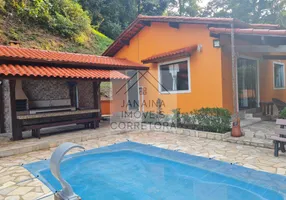 Foto 1 de Casa com 4 Quartos à venda, 150m² em Caneca Fina, Guapimirim