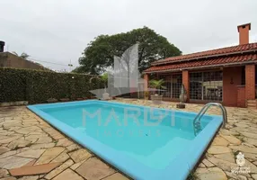 Foto 1 de Casa com 3 Quartos à venda, 156m² em Guarujá, Porto Alegre