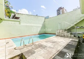 Foto 1 de Casa com 4 Quartos à venda, 110m² em Passo da Areia, Porto Alegre